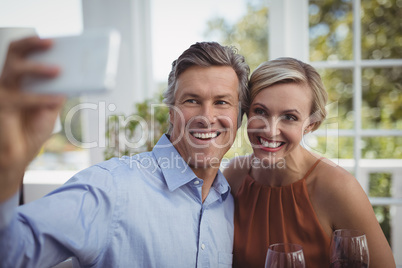 Couple taking selfie with mobile phone