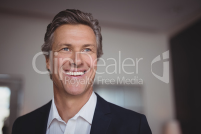 Businessman standing at restaurant