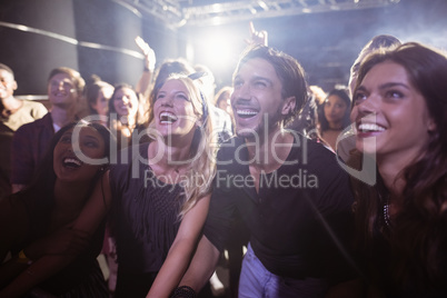 Cheerful people enjoying at nightclub