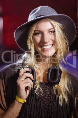 Portrait smiling woman with headphones