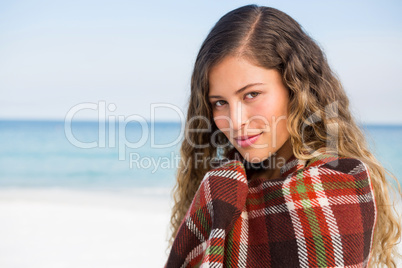 Close up portrait of woman wrapped in blanket