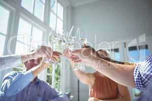 Group of executives toasting glasses of champagne