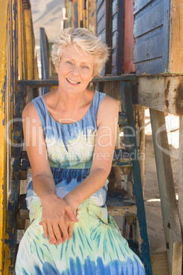 Portrait of senior woman sitting on steps