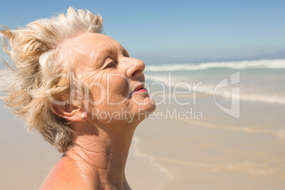 Close up of senior woman with eyes closed