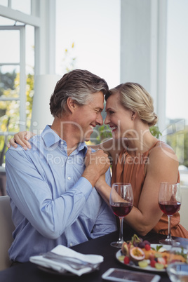 Couple enjoying together in restaurant
