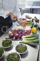 Chef chopping vegetables