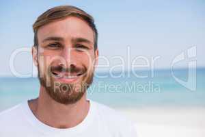 Close up of portrait of smiling man beach