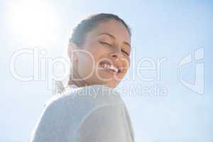 Low angle portrait of smiling woman