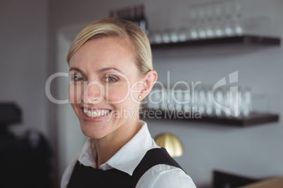 Portrait of smiling waitress