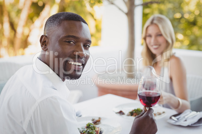 Couple toasting their wine glasses