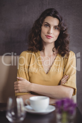 Beautiful woman sitting in restaurant