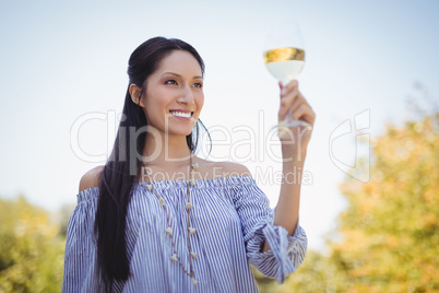 Young woman holding a wine glass