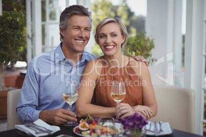 Couple having wine in restaurant