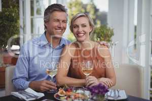 Couple having wine in restaurant