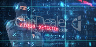 Composite image of male hacker standing with arms crossed