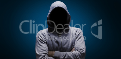 Composite image of hacker standing with arms crossed
