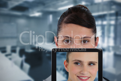 Composite image of portrait of female doctor with digital tablet