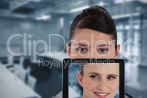 Composite image of portrait of female doctor with digital tablet