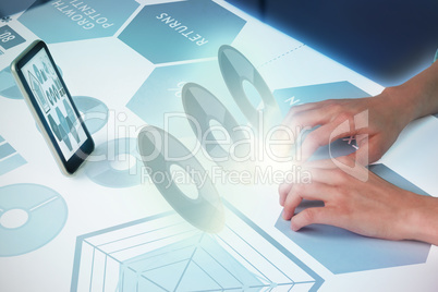Composite image of hand typing on invisible keyboard