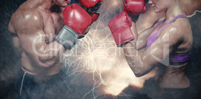 Composite image of side view of boxers with fighting stance