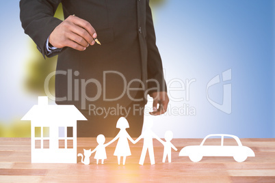Composite image of underwriter drawing a family