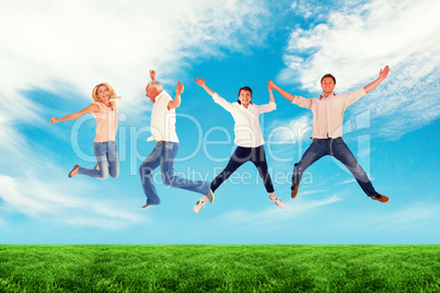 Composite image of men and women jumping against white background