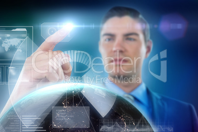 Composite image of businessman touching digital screen