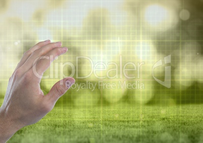 Hand touching  air with green nature technology grid