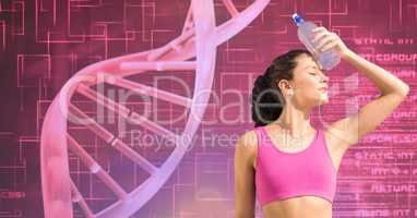 Young fit woman touching water bottle on forehead by DNA structure