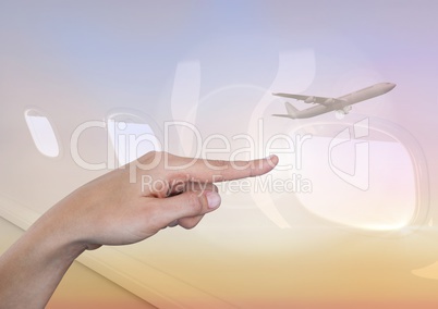 Hand pointing in  air of sky with airplane