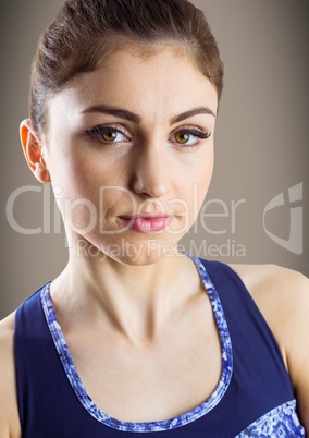 Close up of confident woman against brown background