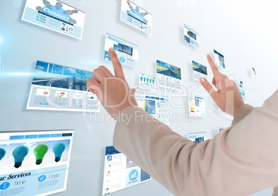 panels with websites(blue) in light background. woman hands doing something on it
