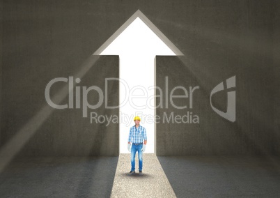 Male architect standing at arrow shape doorway