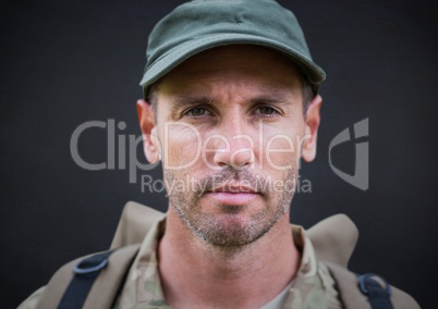 Soldier face against navy chalkboard