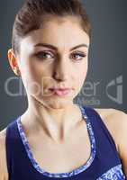 Close up of confident woman against grey background
