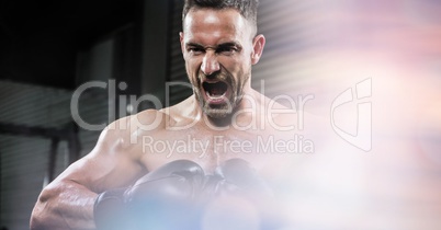 Angry boxer screaming at gym