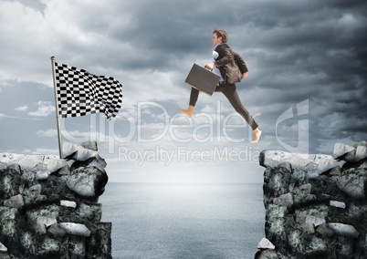businessman with briefcase jumping on the rocks to arrive to the checker flag