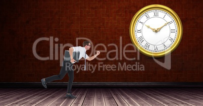 Businessman running late with clock in background