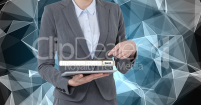 Midsection of businesswoman pointing at screen over digital tablet