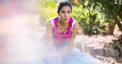 Female jogger looking away in park