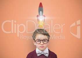 Little boy wearing eyeglasses with rocket over head