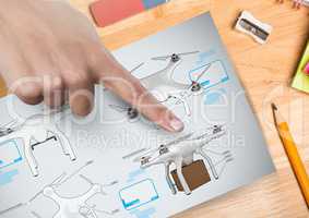 Hand pointing at a Drone DIY drawings plans