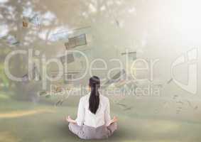 panels with websites flaying and business woman meditating in the park
