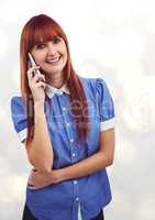 Redhead businesswoman using smart phone