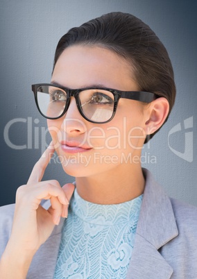 Close up of business woman with glasses thinking against navy background