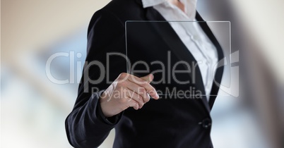 Midsection of businesswoman showing transparent device