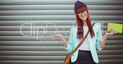 Redhead woman gesturing against wall