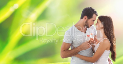 Loving couple holding champagne flutes outdoors