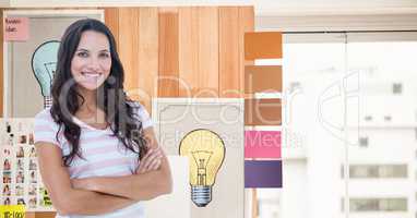 Smiling businesswoman with arms crossed against graphics