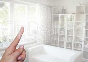 Hand pointing in  air of home living room